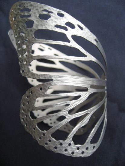brazalete mariposa, Dolores Lago Dolores Lago